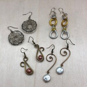 Bundle 4 handcrafted artisan wire style statement earrings.